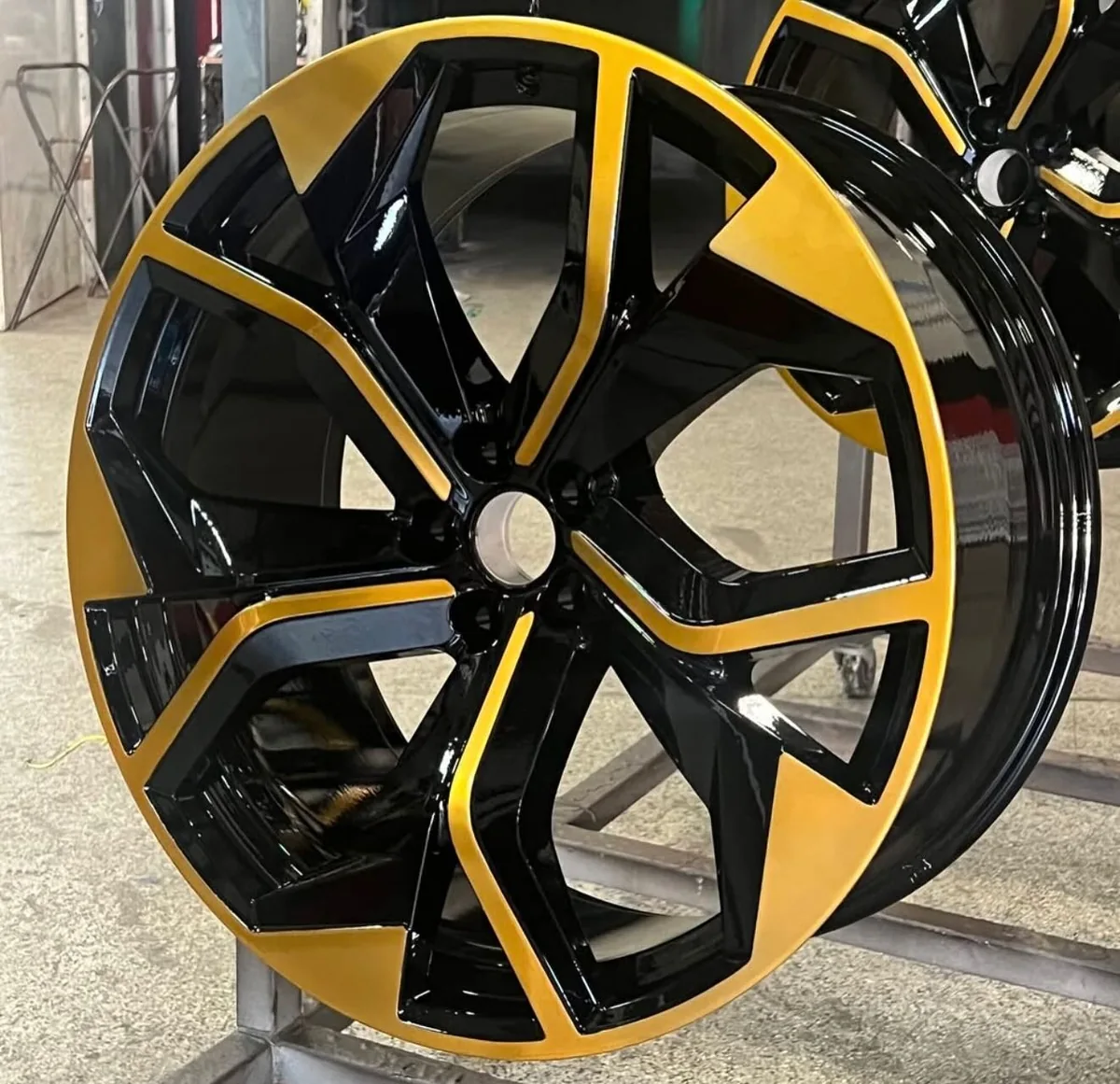 Black wheels with gold colored accents